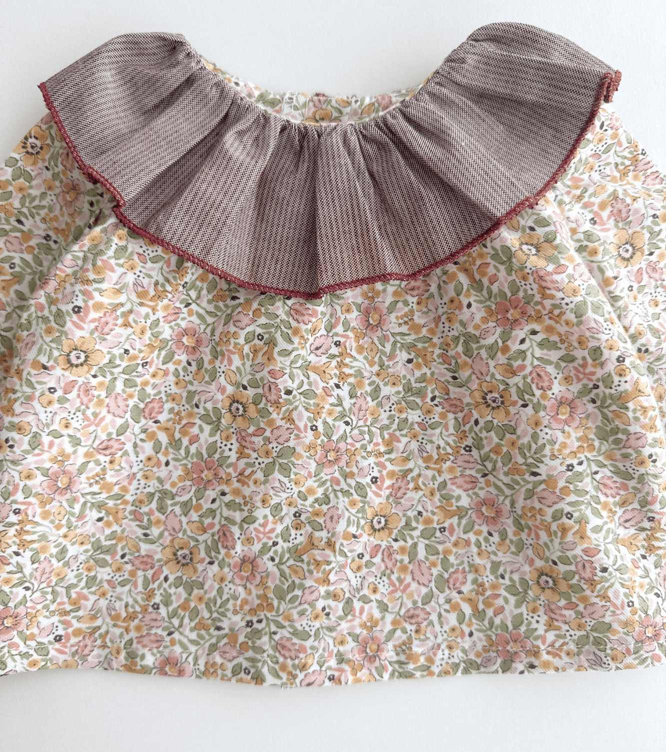 Blusa volantes bebé | Savia | Flores y Rayas Burdeos