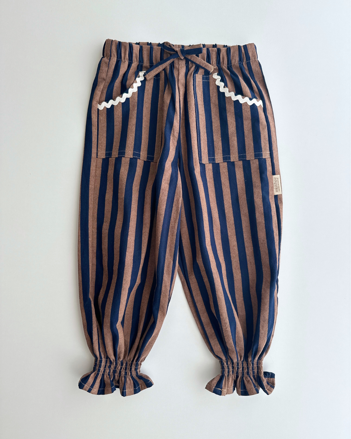 Pantalón bombacho | Castaño | Rayas