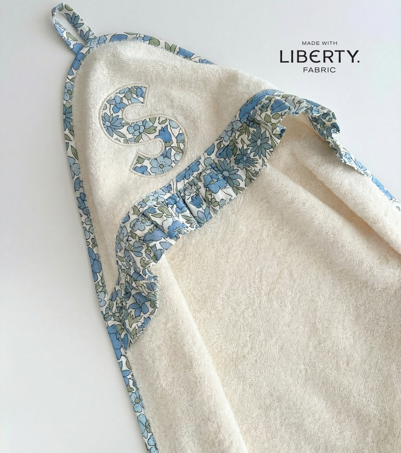 Toalla Capa Personalizada | Nomeolvides | Flores azul