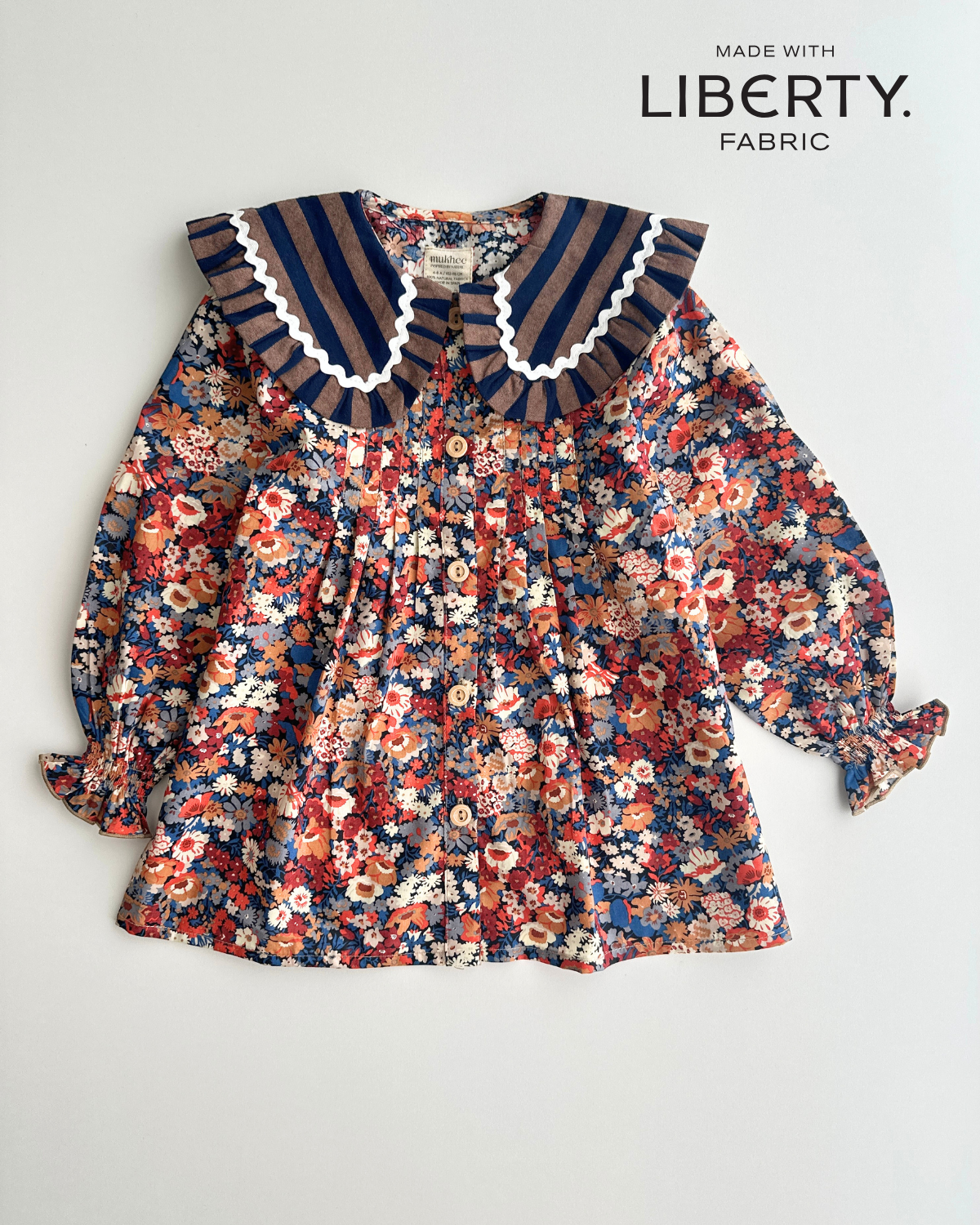 Blusa jaretas | Castaño| Flores y rayas